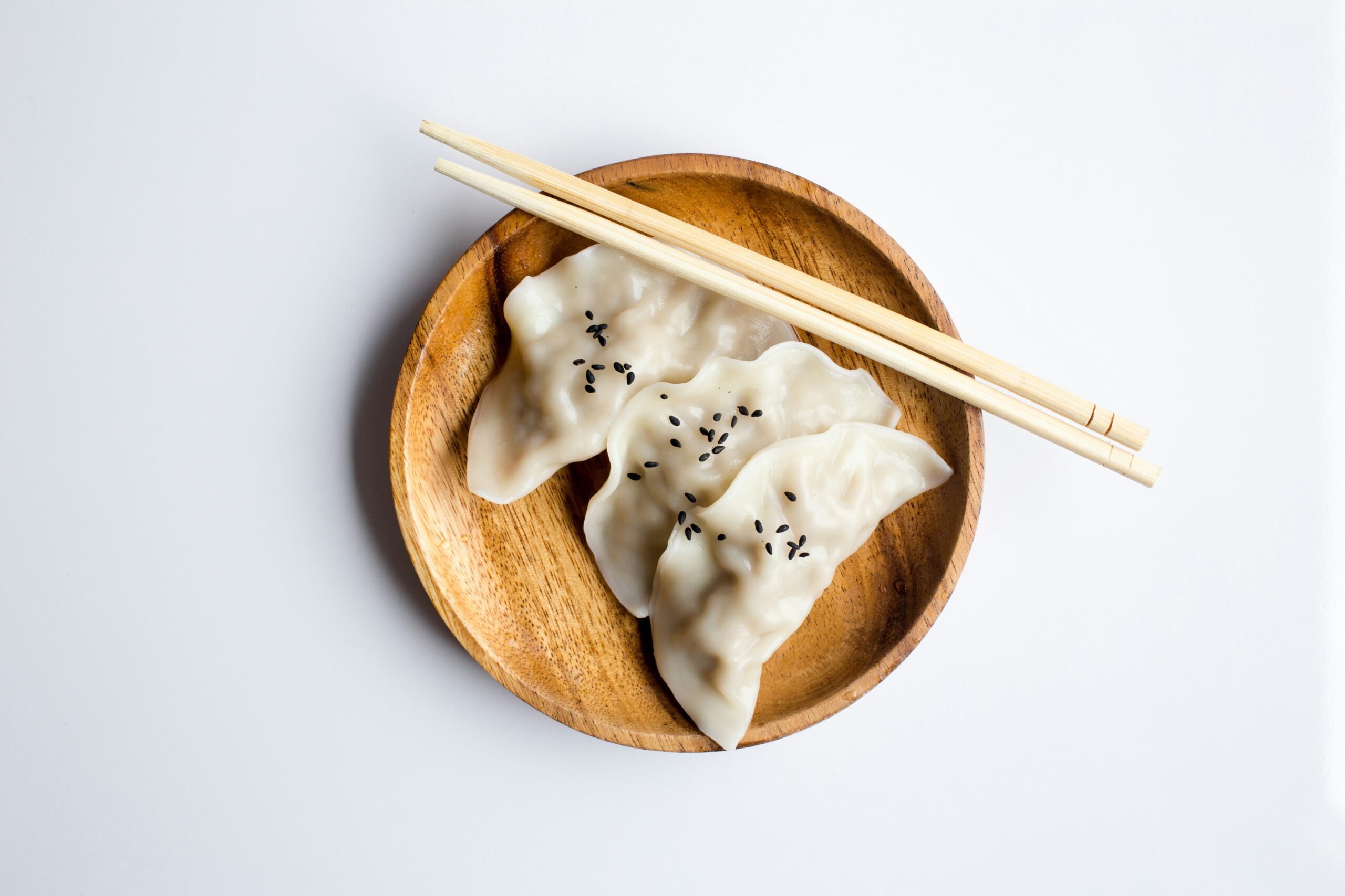 Three dumplings on a plate