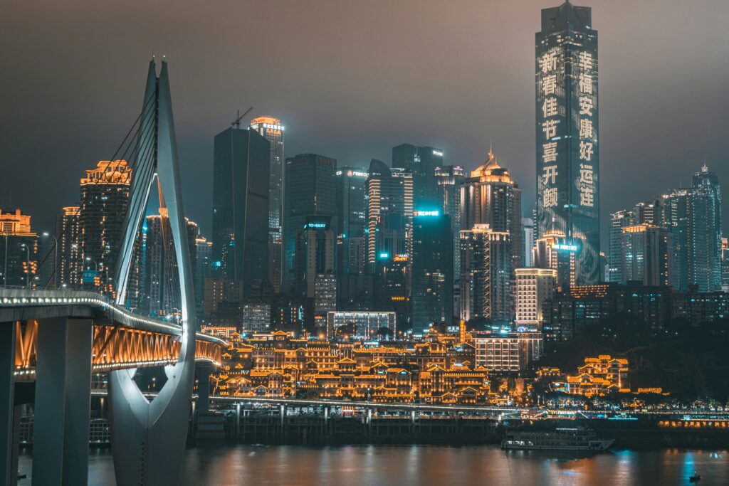 View over Chongqing by night with many street lights and buildings